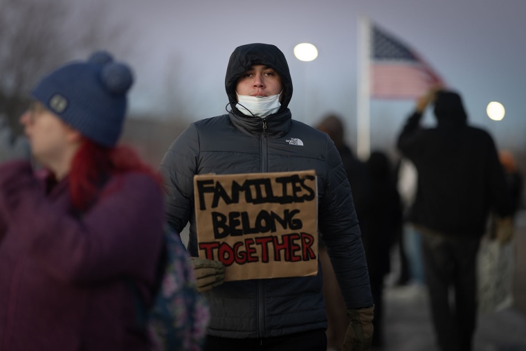 Demonstrators protest outside of the Whipple federal building on January 14, 2026 in Minneapolis, Minnesota. 