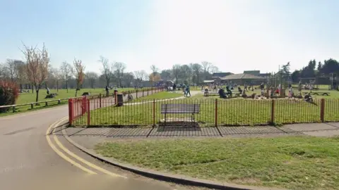Google Wide shot of Sutton Lawn park under sunny skies
