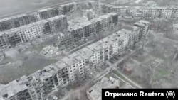 A drone view shows damaged buildings in Myrnohrad.