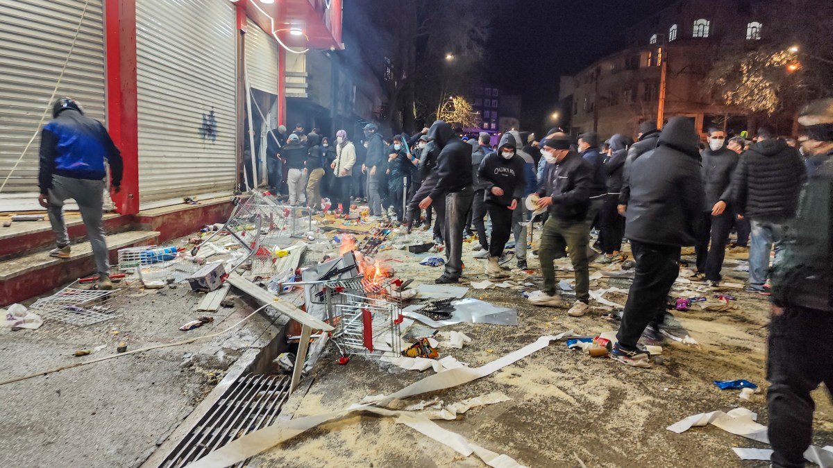 statue toppled and fires on 12th day as death toll rises