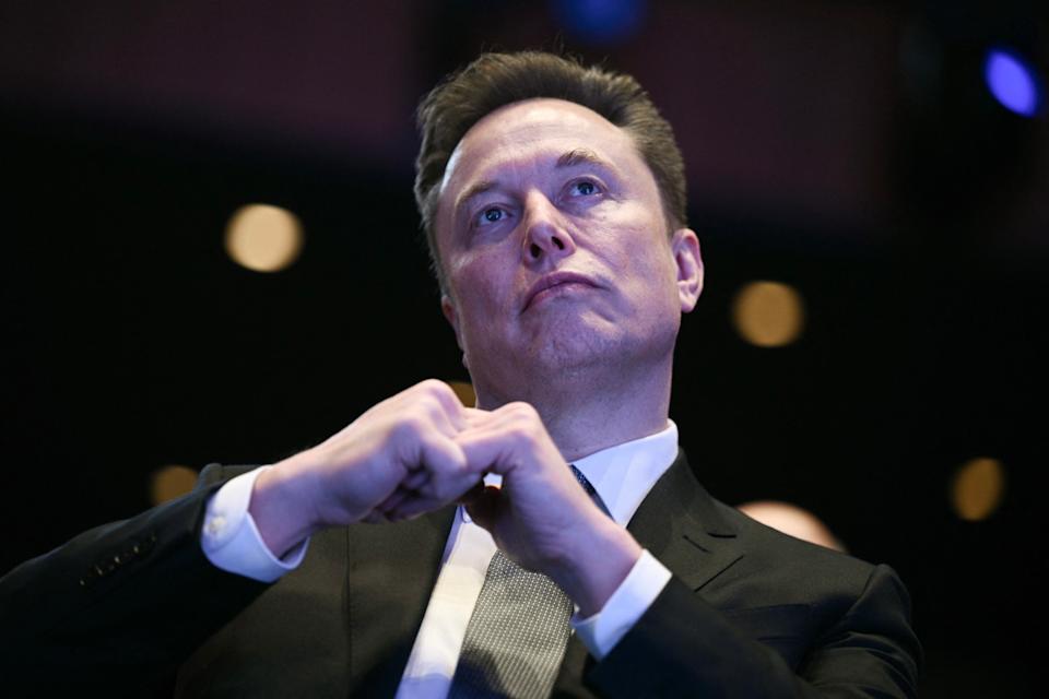 Elon Musk looks on as US President Donald Trump speaks at the US-Saudi Investment Forum at the John F. Kennedy Center for the Performing Arts in Washington, DC on November 19, 2025. BRENDAN SMIALOWSKI&sol;AFP via Getty Images