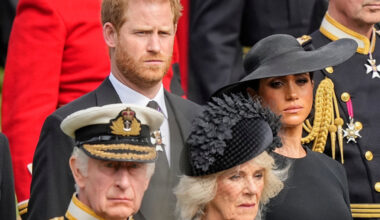 Britain's King Charles III, from bottom left, Camilla, the Queen Consort, Prince Harry and Meghan, Duchess of Sussex watch as the coffin of Queen Elizabeth II is placed into the hearse following the state funeral service in Westminster Abbey in central London Monday Sept. 19, 2022. [AP/YONHAP]