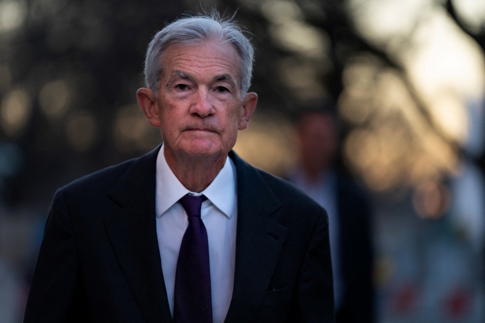 Federal Reserve Chair Jerome Powell arrives at the US Federal Reserve in Washington January 13, 2026. — Reuters pic