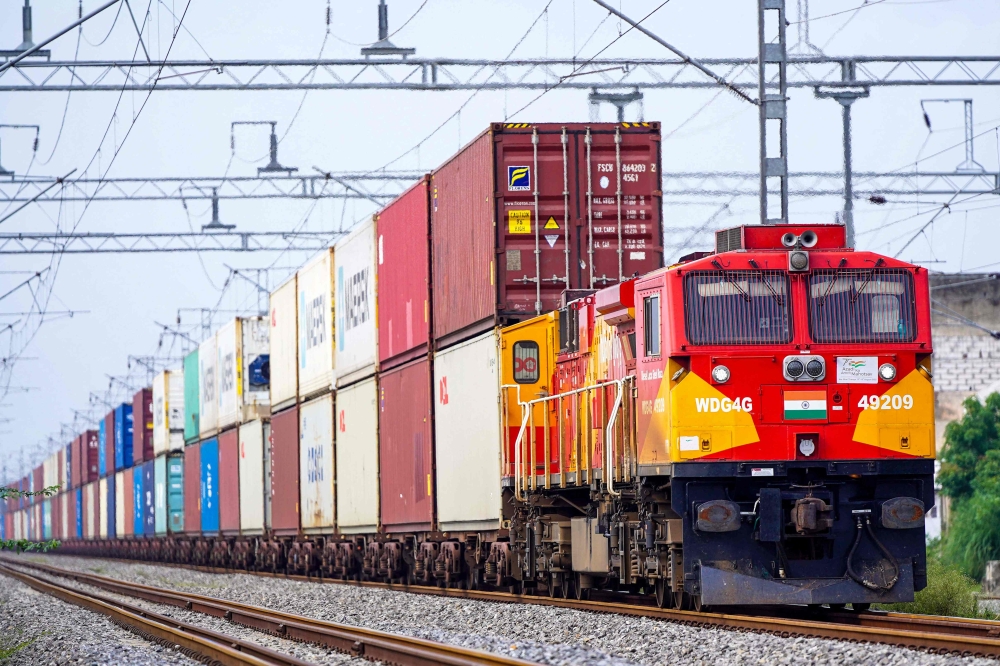 A freight train carrying cargo containers rides along a railway track in Ajmer, India. The country and the European Union announced on January 27, 2026 the ‘mother of all’ trade deals to create a market of two billion people, reached after two decades of negotiations. — AFP pic
