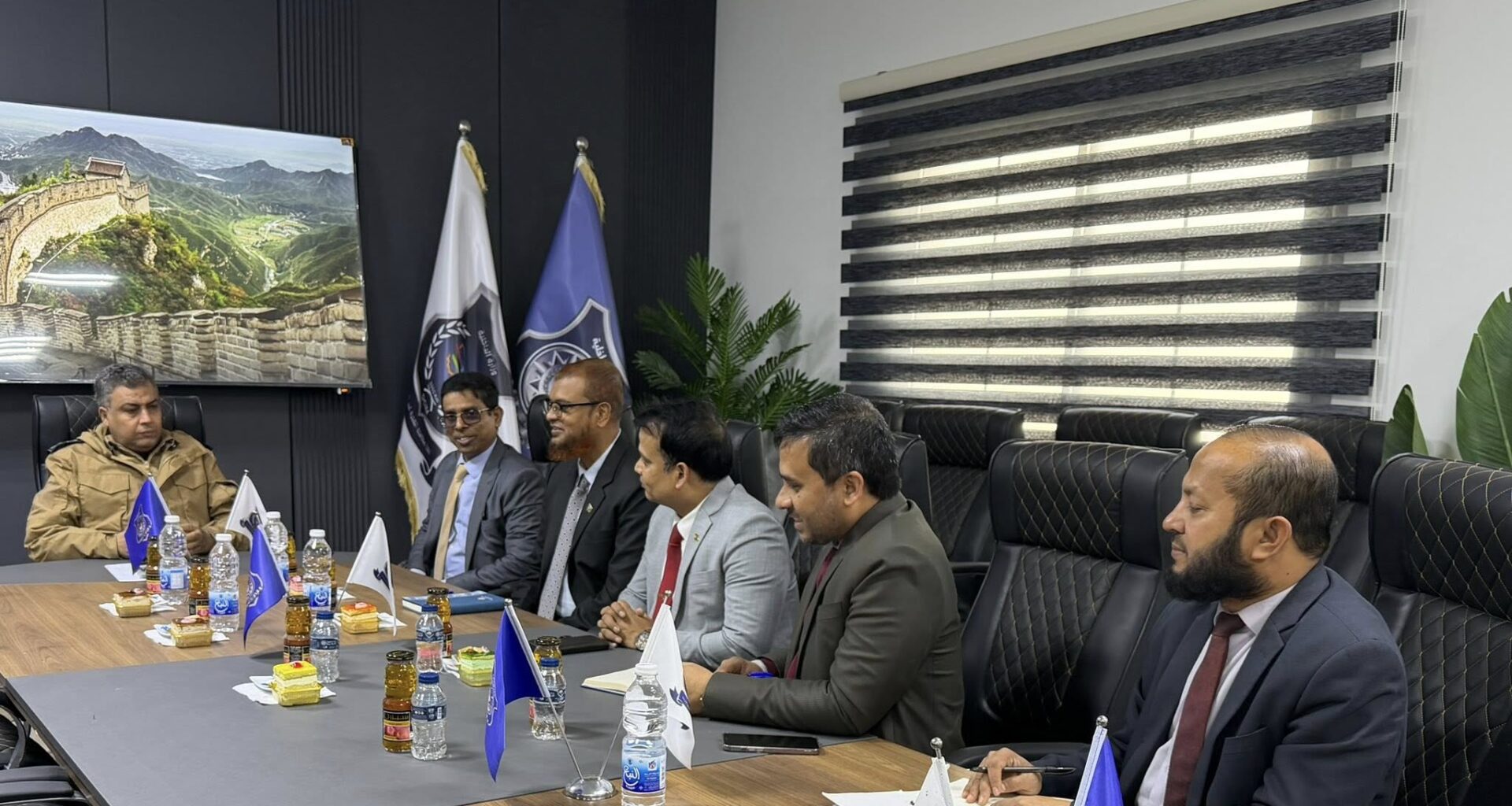 The Bangladeshi Chargé d'Affaires to Libya inspects the conditions of his country's illegal migrants at a shelter center east of Tripoli