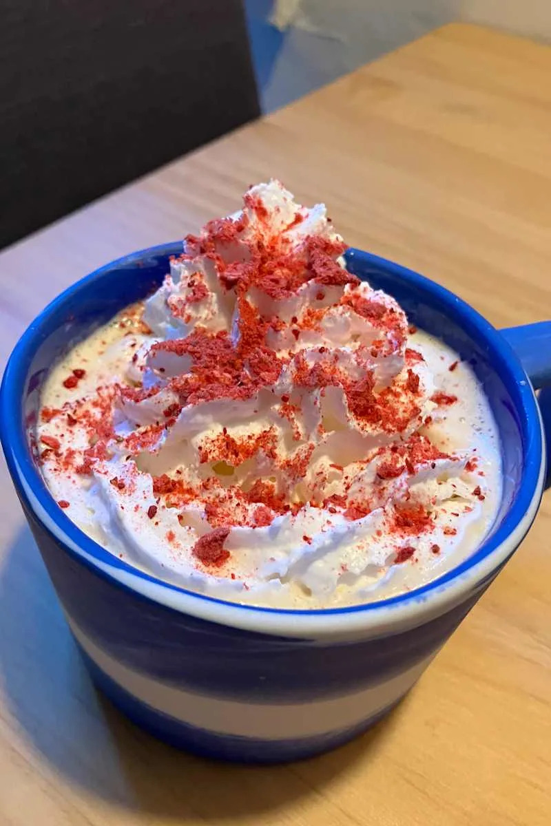 Trader Joe’s Freeze-Dried Strawberries ad top a coffee.