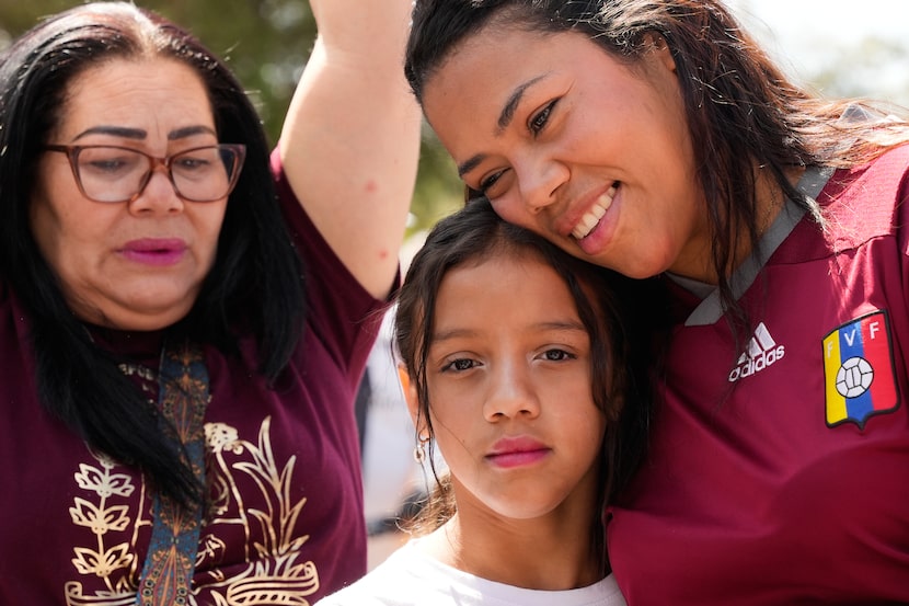 Venezuelans gather in Quito, Ecuador, Saturday, Jan. 3, 2026, after U.S. President Donald...