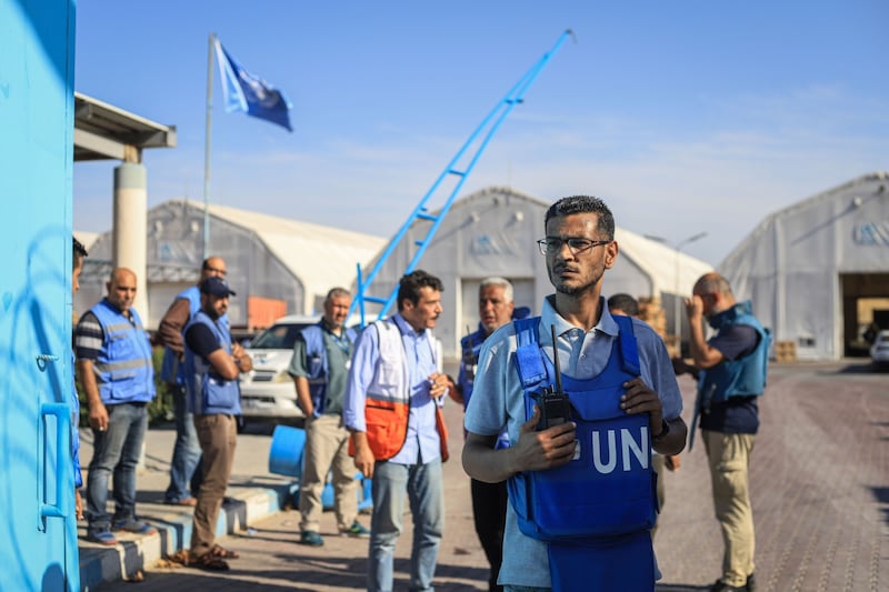 Relief workers await the arrival of trucks carrying aid at a Unwra  warehouse in Gaza. File image. Photograph: Ahmad Salem/Bloomberg