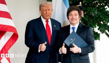 US President Donald Trump, left, and Javier Milei, Argentina's president, smile with their thumbs up outside the West Wing of the White House in Washington, DC, US, on Tuesday, Oct. 14, 2025, shortly after the US agreed to extend financial support for the Argentine peso.