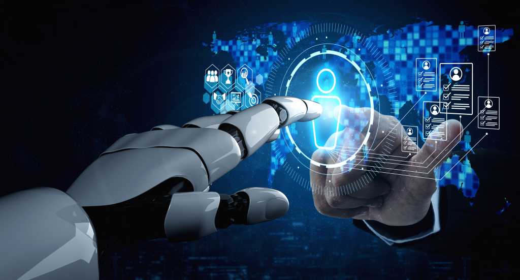 Robot hand and human hand extend toward either side of a virtual touchscreen to click a humanoid figure on the screen.