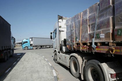 Trucks waiting at the Kerem Shalom crossing between Israel and Gaza last week.