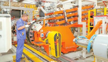 A worker operates an intelligent production line in Suqian, East China