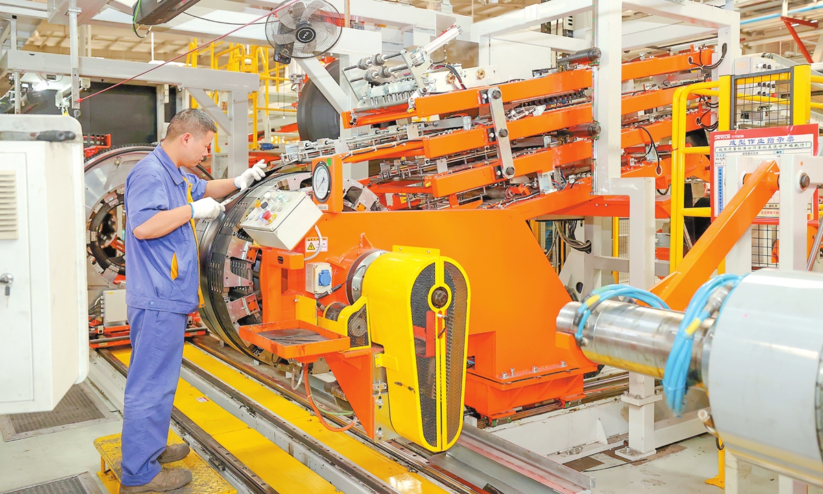 A worker operates an intelligent production line in Suqian, East China's Jiangsu Province, on November 18, 2025. In recent years, the city has focused on strengthening enterprises' capacity for technological innovation, advancing intelligent manufacturing, and promoting the high-quality development of high-tech firms. VCG
