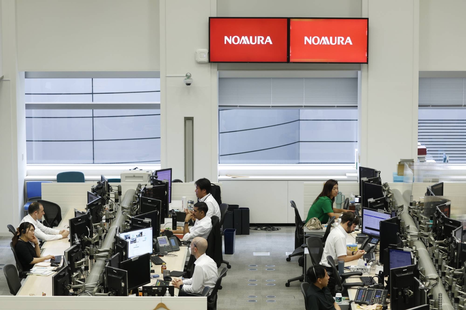 Nomura beats Goldman to top spot in record M&A year for Japan