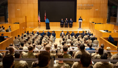 U.S. Air Force Cadet 1st Class Jack Marsh, moderates the plaque ceremony commemorating the Battle of Britain in Polaris Hall at the U.S. Air Force Academy, Colo., on Jan. 16, 2026. The commemoration of the battle emphasized that Airmen, when called upon, must be ready to answer. (U.S. Air Force photo by Ray Bahner)