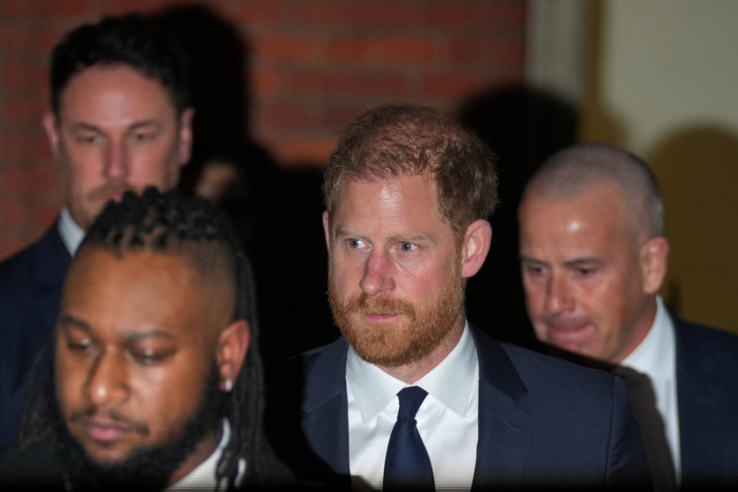 Britain's Prince Harry leaves London's High Court after leading a group, including Elton John and Elizabeth Hurley, accusing the Daily Mail's publisher of privacy invasion through unlawful tactics in a trial that is part of a wider phone hacking scandal in London, Jan. 19. [AP/YONHAP]