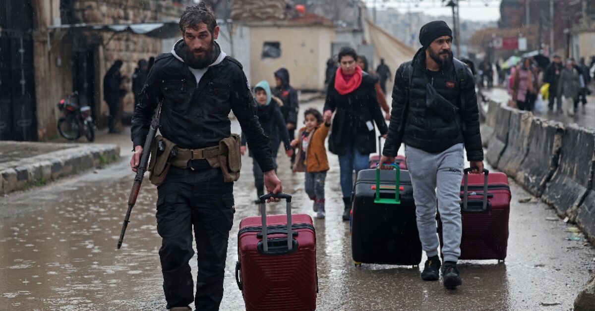 Syria urges Kurdish fighters to surrender after ramping up Aleppo operation