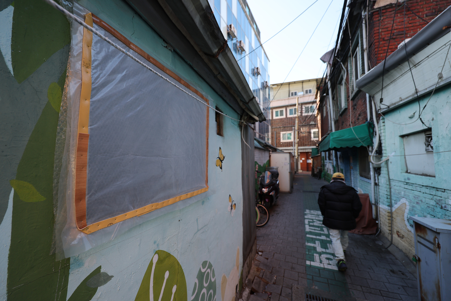 The window of a house in a neighborhood in Yeongdeungpo District, western Seoul, mostly with one-room houses, is covered with a plastic layer to fend off the cold, on Dec. 4, 2025. [YONHAP]