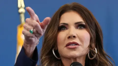AFP via Getty Images US Secretary of Homeland Security Kristi Noem speaks during a press conference to discuss ICE operations in New York City on January 8, 2026