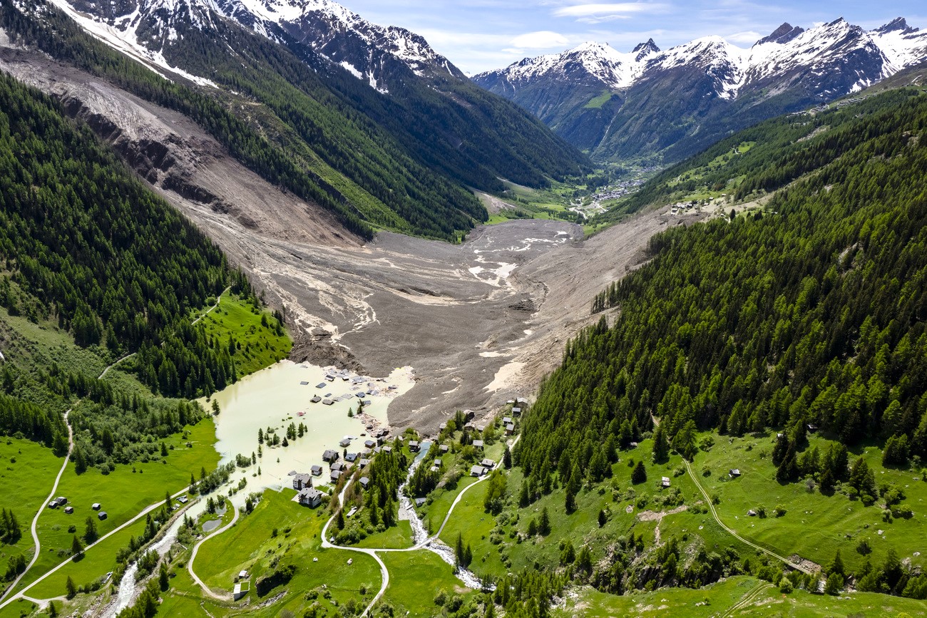 alpine village buried by a landslide of debris