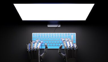 Robotic hands are seen typing on a keyboard.