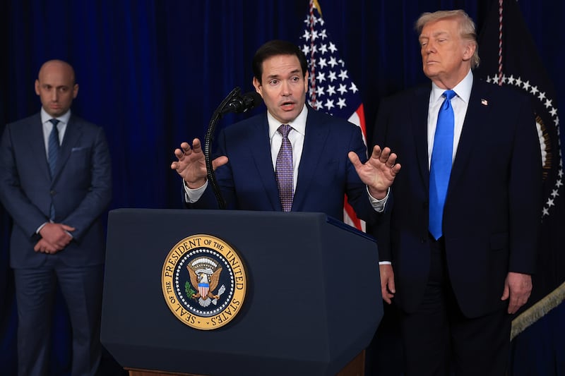 Secretary of State Marco Rubio speaks during a press conference as President Donald Trump stood to his side with his eyes briefly closed at Mar-a-Lago club on January 03, 2026, in Palm Beach, Florida.