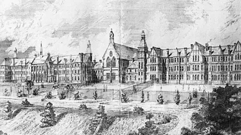 County Asylums A black and white drawing of the asylum shortly after opening, showing a large, three storey Victorian building with fenced in exercise yards in front