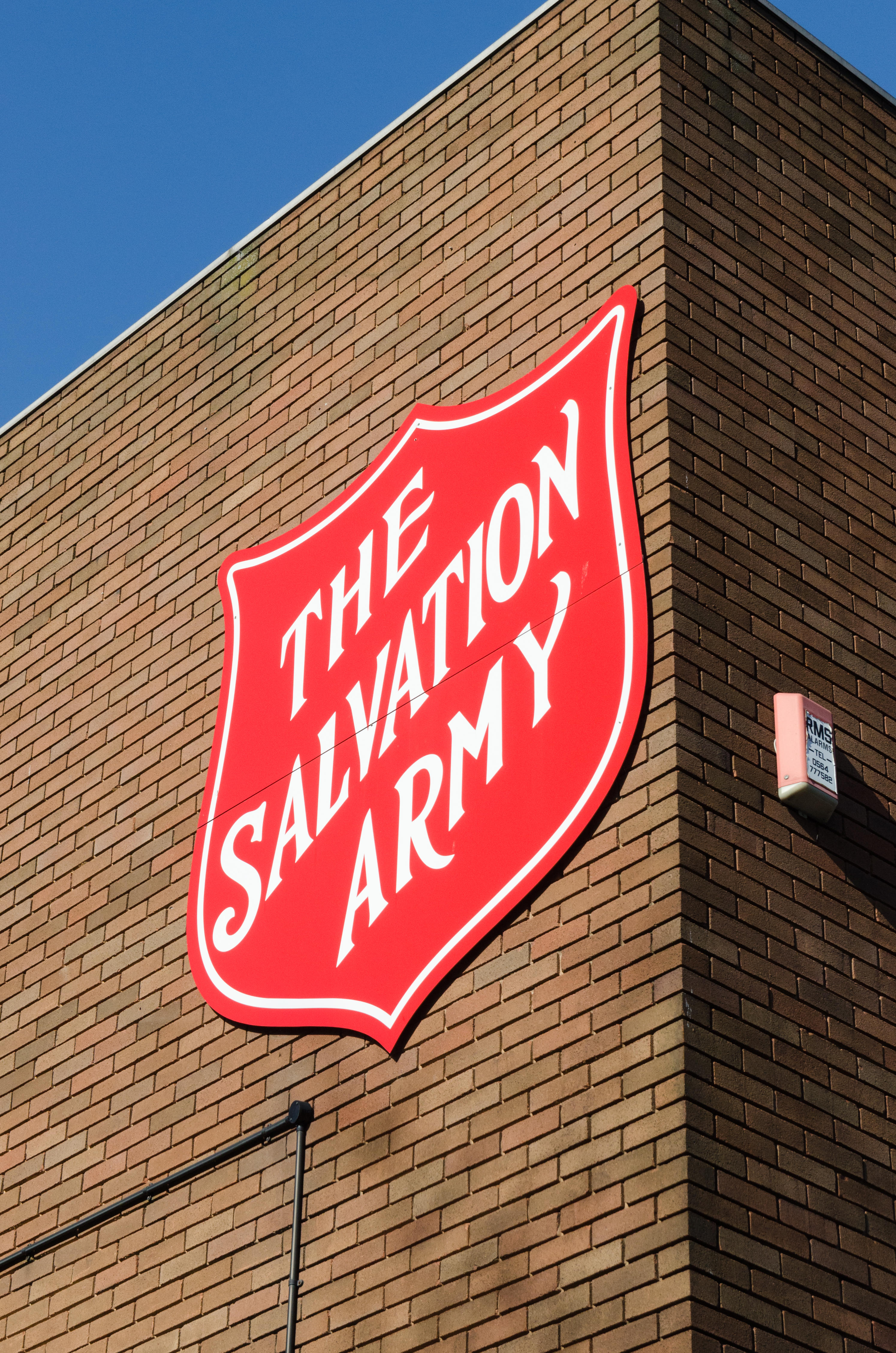 The Salvation Army logo on the side of a building