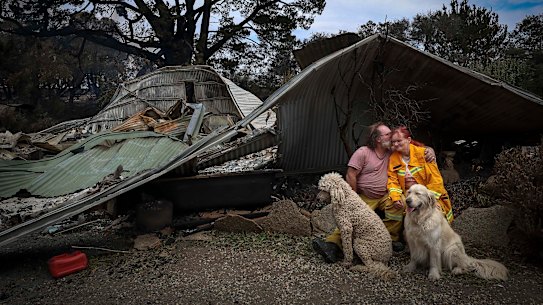 Ann and Jamie Laherty-Hunt grapple with the aftermath of fire at their property in Ruffy.