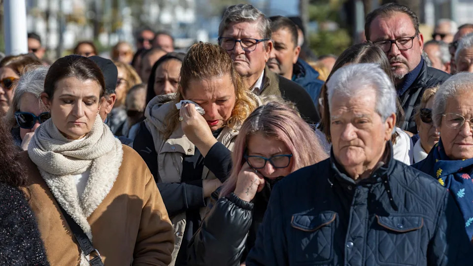 People gather to observe a minute of silence in memory of the victims of the train collision that occurred on 18 January, in Punta Umbria, Huelva, Spain, on 20 January 2026. Several residents of Punta Umbria are among those killed after a high-speed train carrying more than 300 passengers derailed and collided with an oncoming train on an adjacent track. Emergency services remain at the scene as recovery efforts continue.