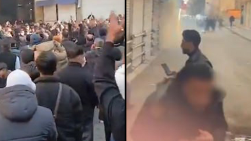 Police officer killed in Iran protests as Tehran signals it may strike US or Israel f