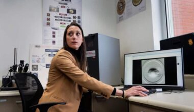 Rachel Beninati, a forensic science examiner, shows how the The NIBIN analyzation system at the Connecticut Forensics Lab works in Meriden, Connecticut on December 29, 2025. (Ayannah Brown/Connecticut Public)
