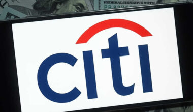 Citigroup Inc logo and money background-by photo_gonzo via Shutterstock