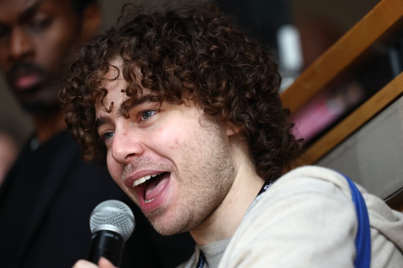 Shayne Coplan, founder and chief executive of Polymarket, speaks during the New York Times annual DealBook summit