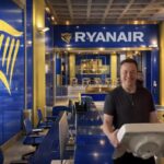 Edited image of Elon Musk entering the Ryanair HQ with a bathroom sink.