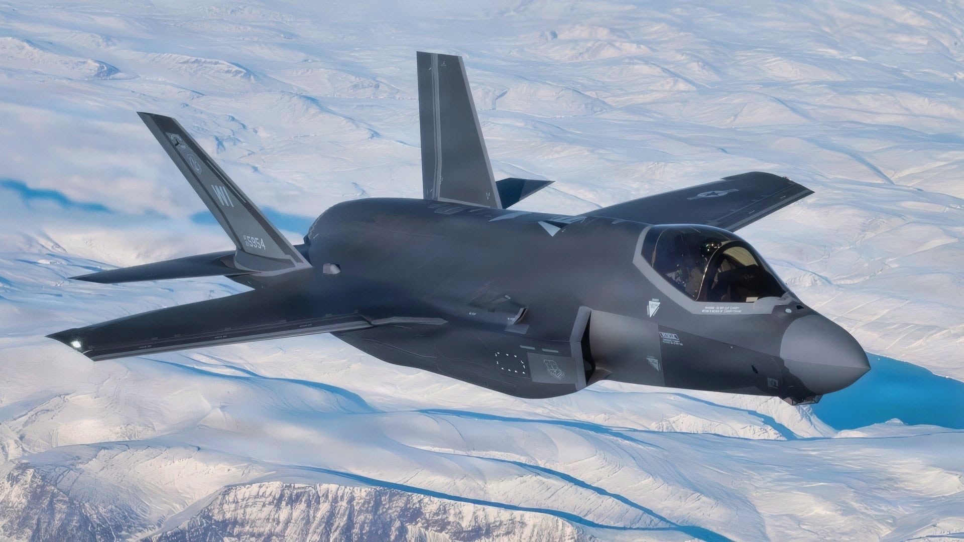 A North American Aerospace Defense Command F-35 Lightning II aircraft with the Wisconsin Air National Guard's 115th Fighter Wing, in-flight over Greenland Oct. 9, 2025. Operating in the Arctic provides the flexibility and adaptability needed to overcome logistical hurdles in a dynamic and unforgiving environment. Greenland, as part of the Kingdom of Denmark has long played an important role in the defense of North America, which strengthens NORAD's ability to protect the continent from today's threats and emerging challenges from all approaches. (U.S. Air National Guard photo by 2d Lt Cameron Lewis)