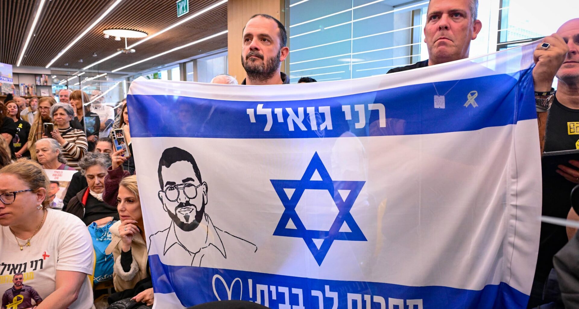 Kibbutz Alumim members gather in Tel Aviv, call for return of hostage Ran Gvili’s body