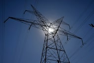 Long-distance transmission power lines cross through Plano near Spring Creek Parkway and the...