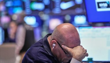 Wall Street ticks higher following a mixed report on the job market