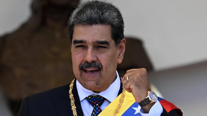 Venezuela's President Nicolas Maduro gestures as he leaves the Capitolio in Caracas on January 10, 2025.