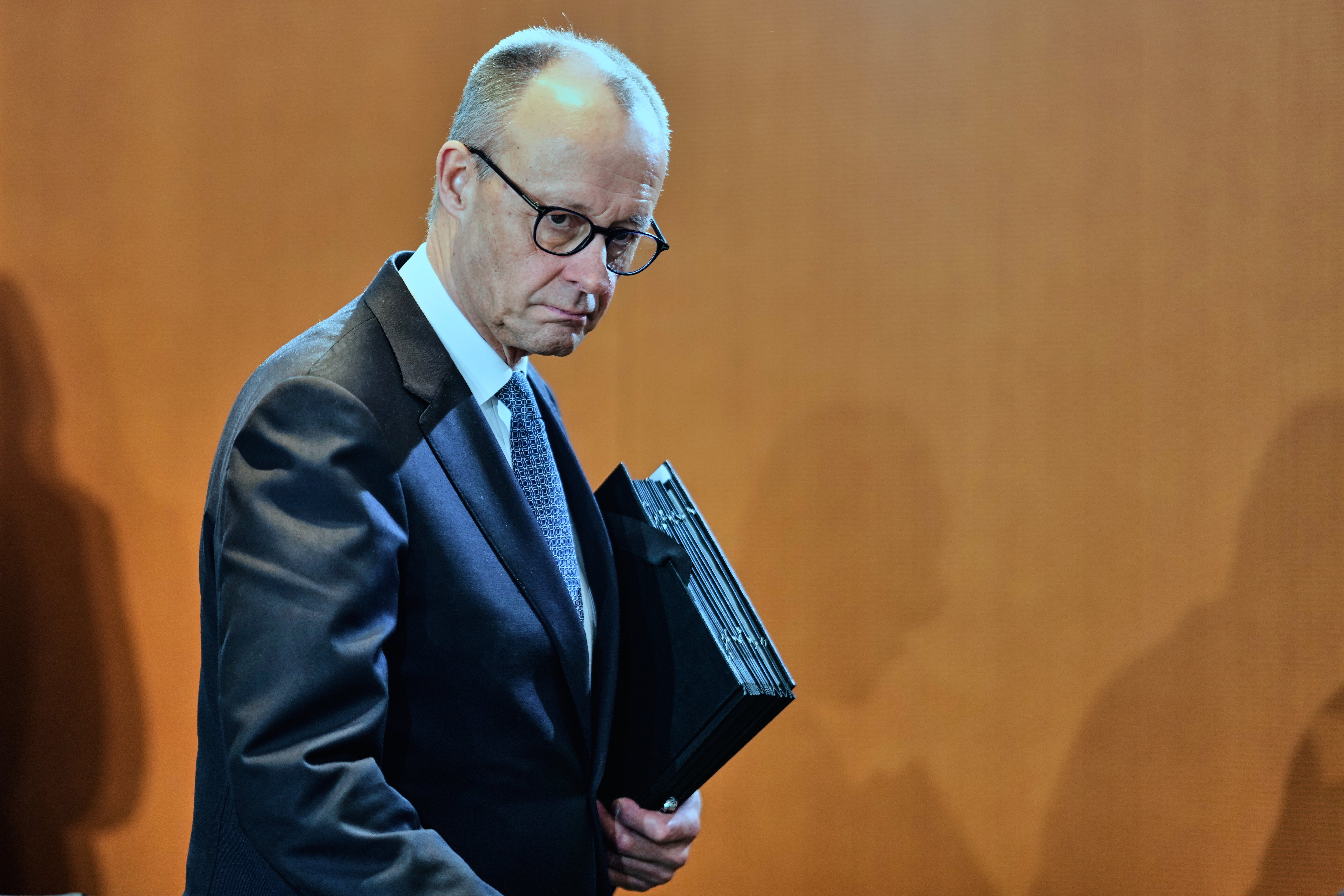 German Chancellor Friedrich Merz arrives for the cabinet meeting at the chancellery in Berlin