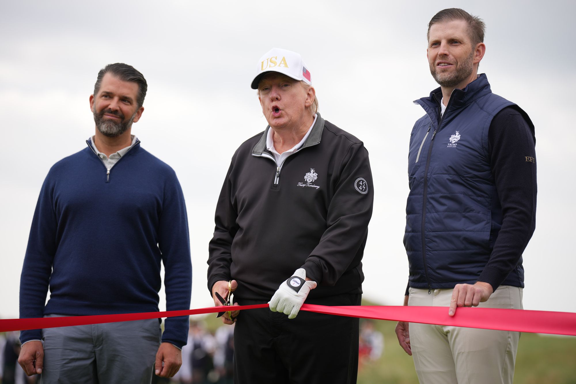 Donald Trump Jr (left) and his younger brother Eric (right) have accompanied their father at public appearances such as this opening of a new golf course in Scotland in July 2025