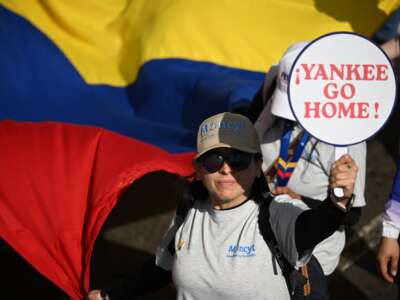 A woman attends a march to demand the release of kidnapped Venezuelan President Nicolás Maduro and his wife Cilia Flores, in Caracas, Venezuela, on January 8, 2026.