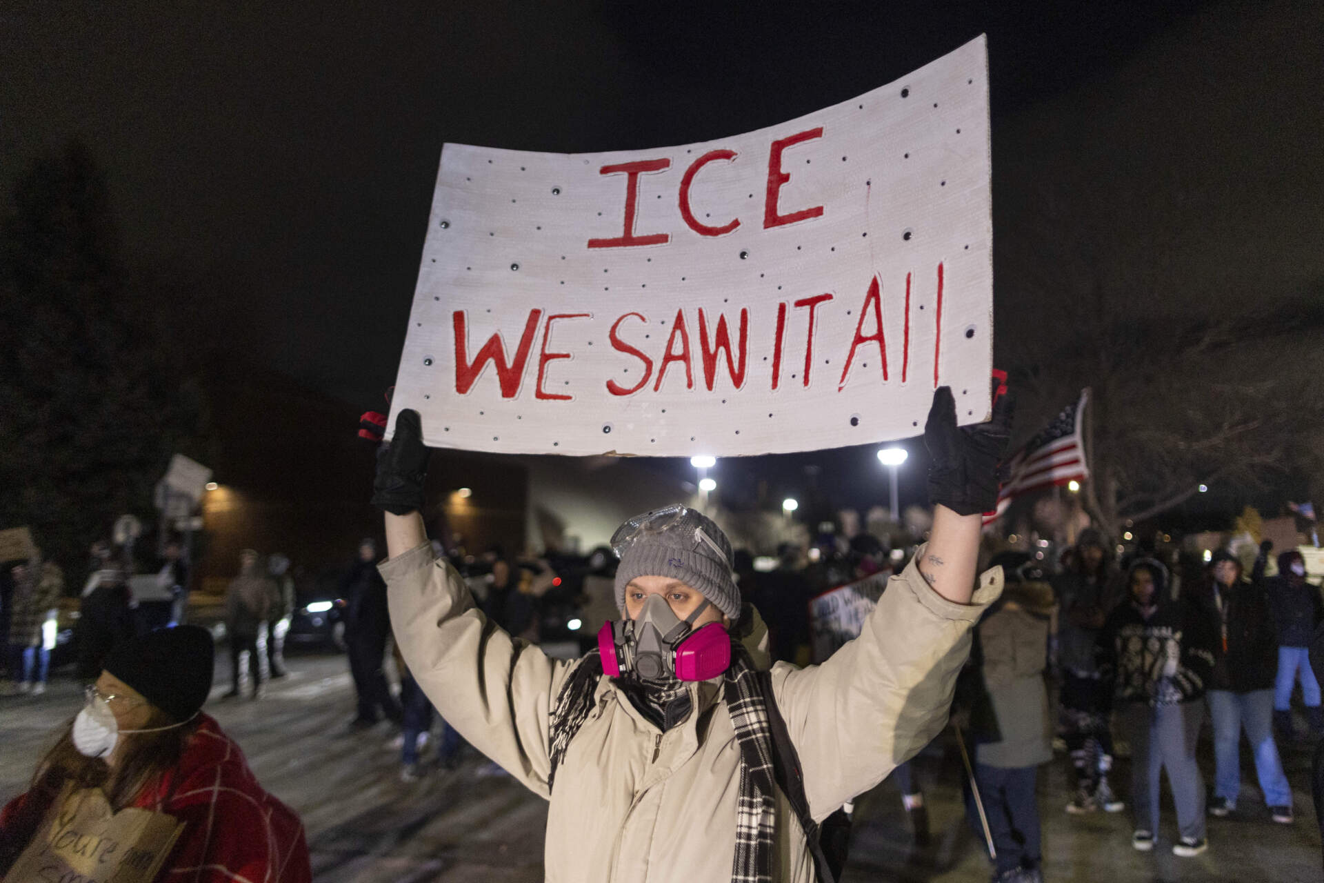 People take part in an anti-ICE protest outside Bishop Henry Whipple Federal Building in Minneapolis. (Mostafa Bassim/Anadolu via Getty Images)