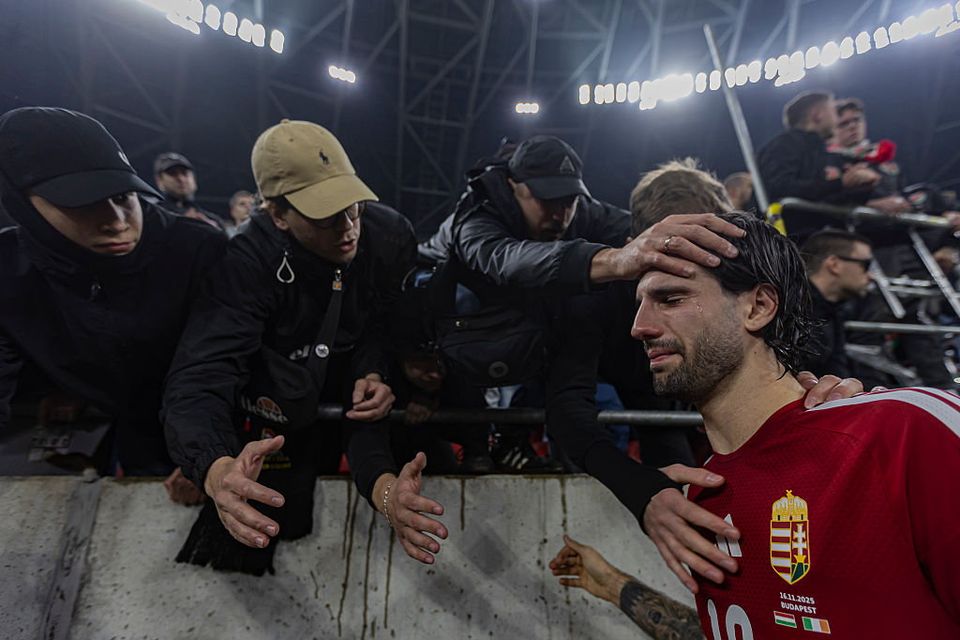 Dominik Szoboszlai of Hungary is consoled by fans after the FIFA 2026 World Cup qualifying defeat to Ireland. (Photo by Robert Szaniszlo/NurPhoto via Getty Images)