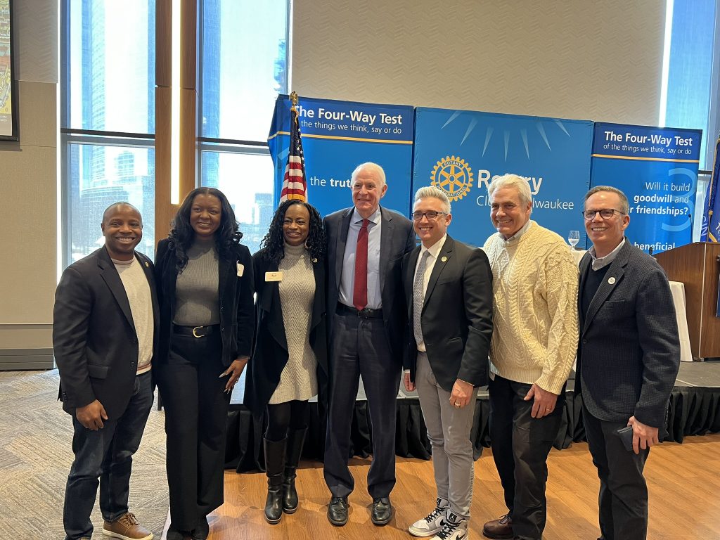 Tom Barrett (center) poses for a picture with Mayor Cavalier Johnson, council members Andrea Pratt, Sharlen P. Moore, Peter Burgelis and Robert Bauman as well as Equal Rights Commission chair Tony Snell after giving a speech to the Rotary Club of Milwaukee. Photo by Jeramey Jannene.