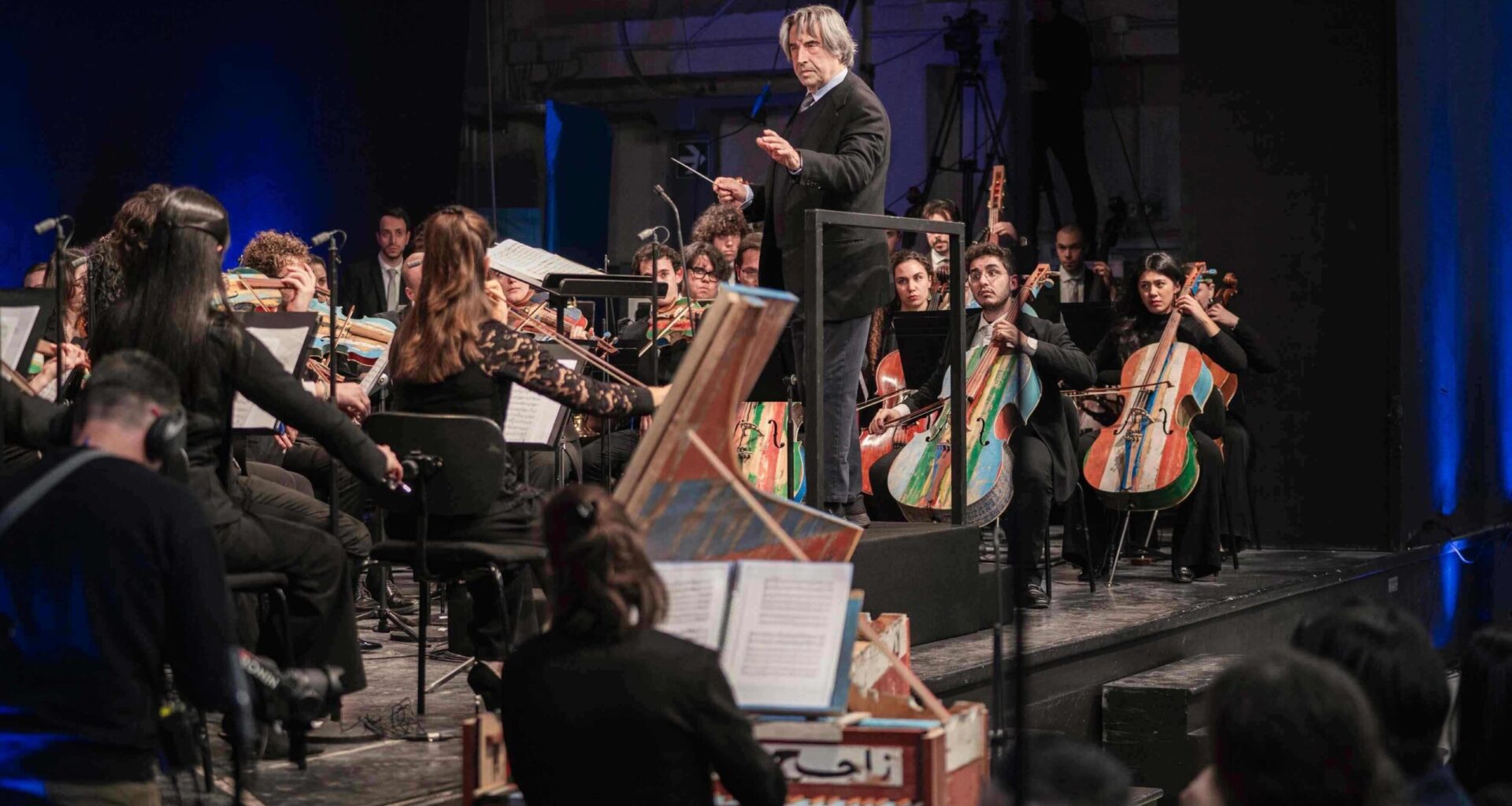 Milan prison hosts concert with instruments made by inmates from migrant smugglers’ boats