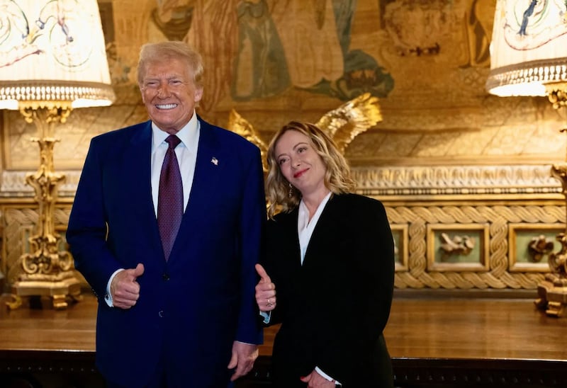 US president-elect Donald Trump with Italian prime minister Giorgia Meloni at Mar-a-Lago in a photo released by the Italian government