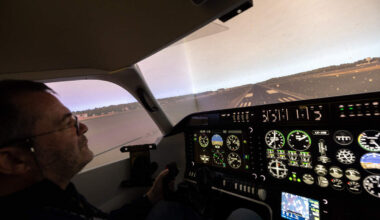 Luxembourg Flight Training Academy President Frank Mack operates a flight simulator exercise replicating takeoff from the Grand Duchy’s only airport.