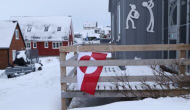 The flag of Greenland hung from the terrace of a house in Nuuk, Greenland.